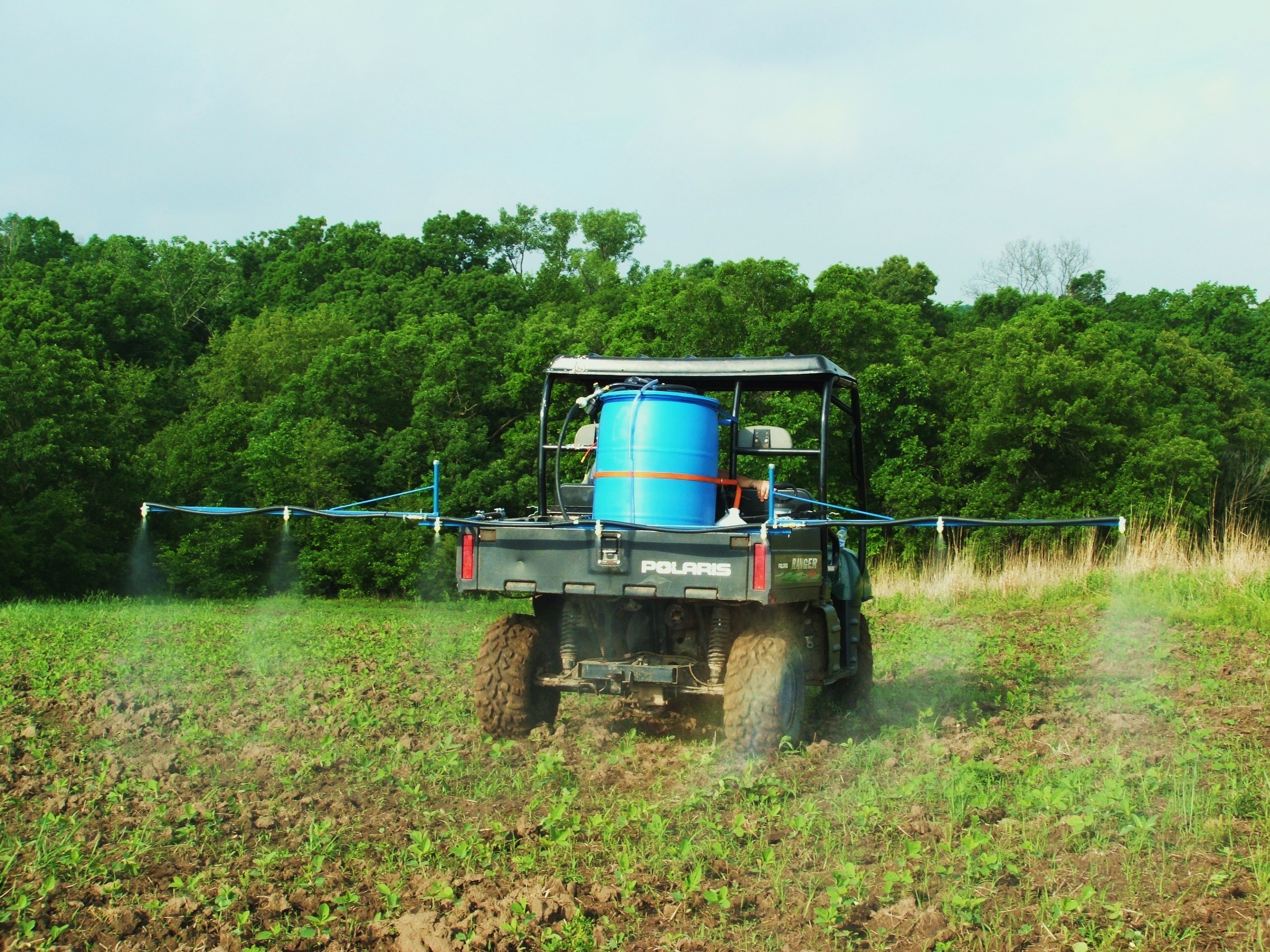 This is my home made sprayer with a 15 foot boom.  I can cover about 18 feet per pass and can cover over 5 acres before needing to refill.  Cost under $300.