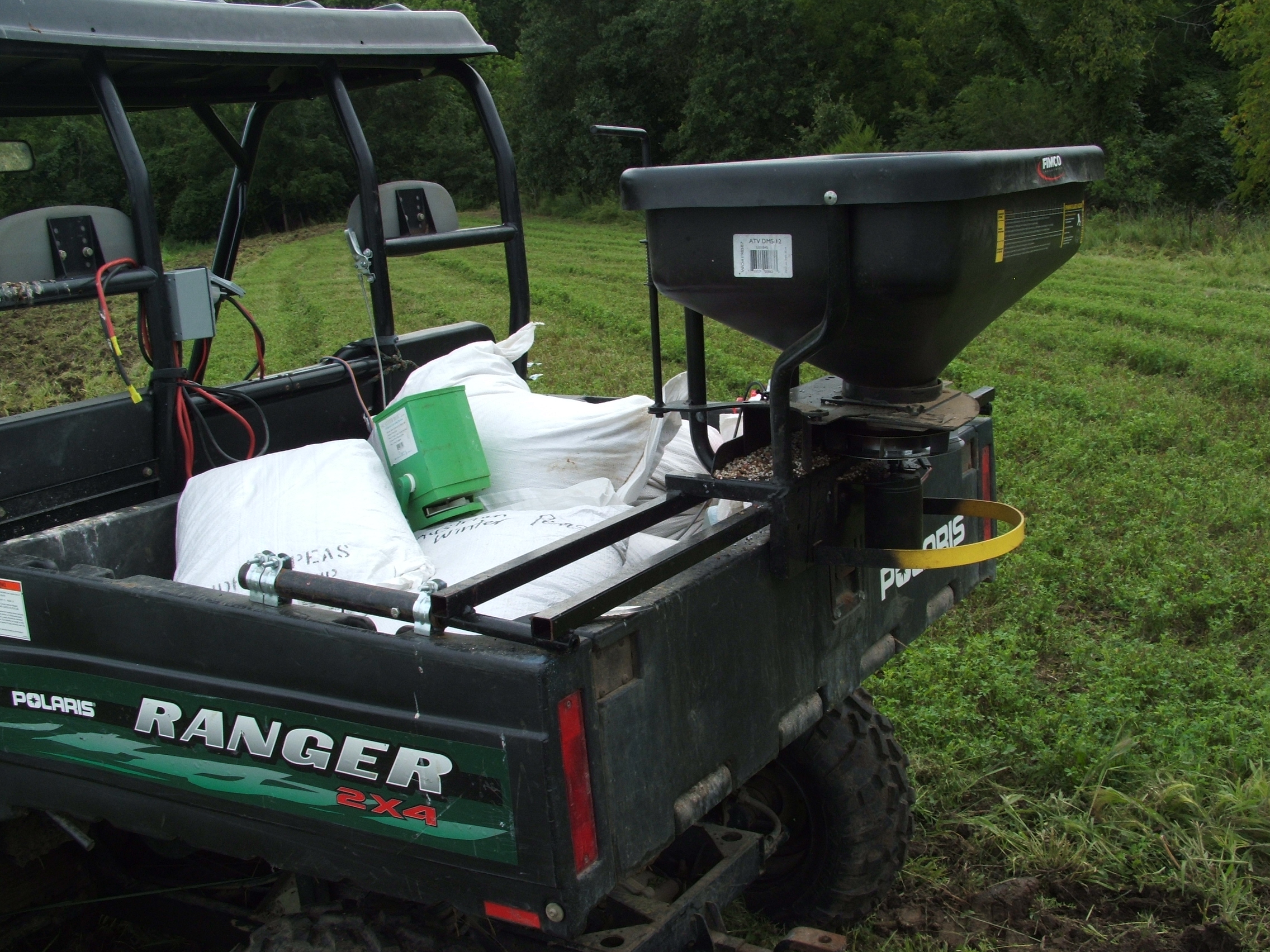 This is my 12volt Fimco seeder.  I altered it so that I can control the seed opening remotely from the front of the Ranger.  The speed is also controlled remotely from a variable speed drive.  This is a very good high end set up.