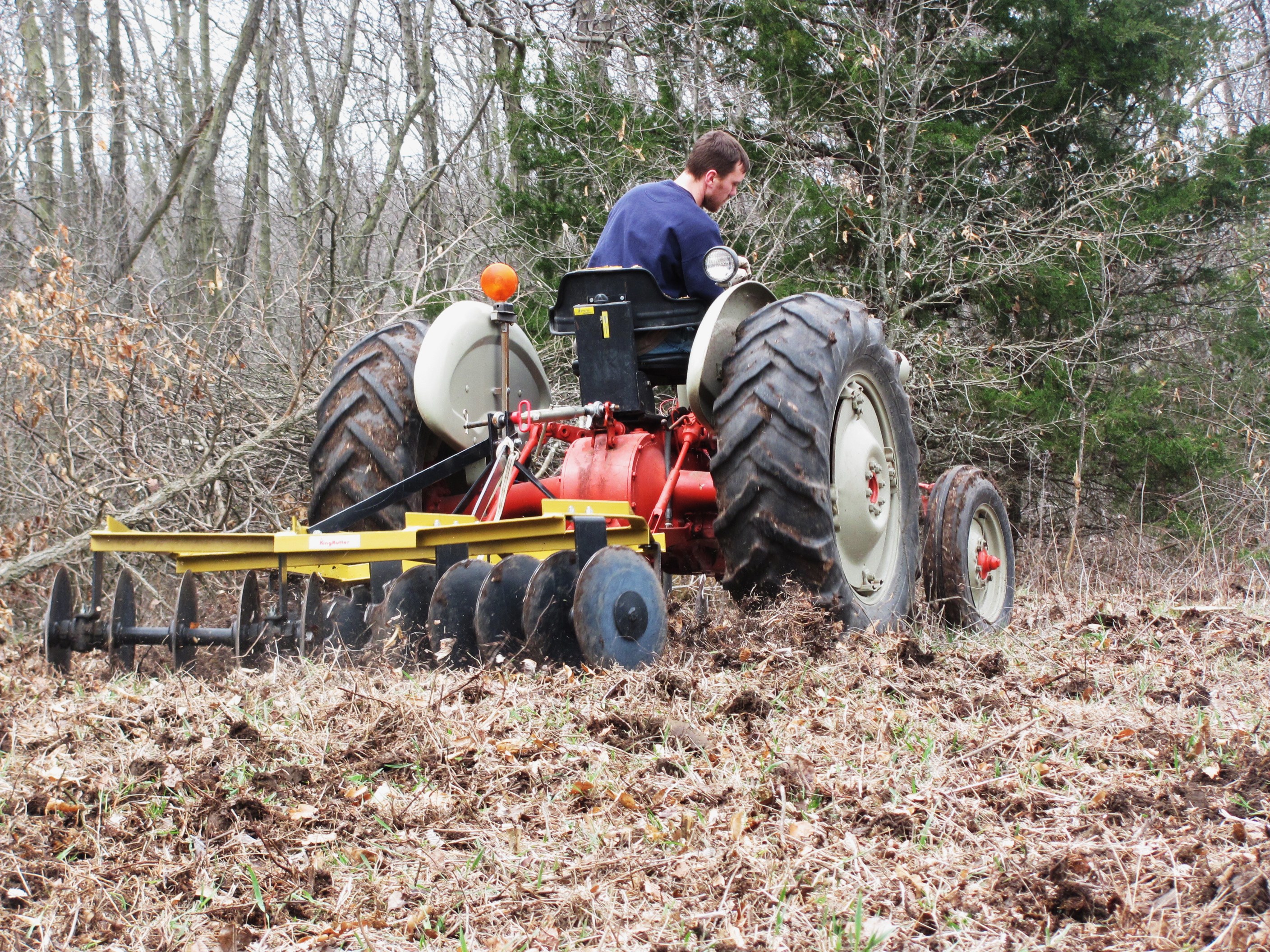 This is my Ford 861 and 6.5 foot King Kutter disc.  A tractor and disc is the best all purpose set up for food plots.  This combo cost me about $4300.